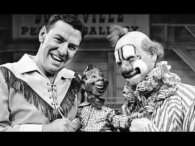 Buffalo Bob Smith, Howdy Doody, and Clarabell the Clown—three iconic characters from the classic children's television show The Howdy Doody Show.