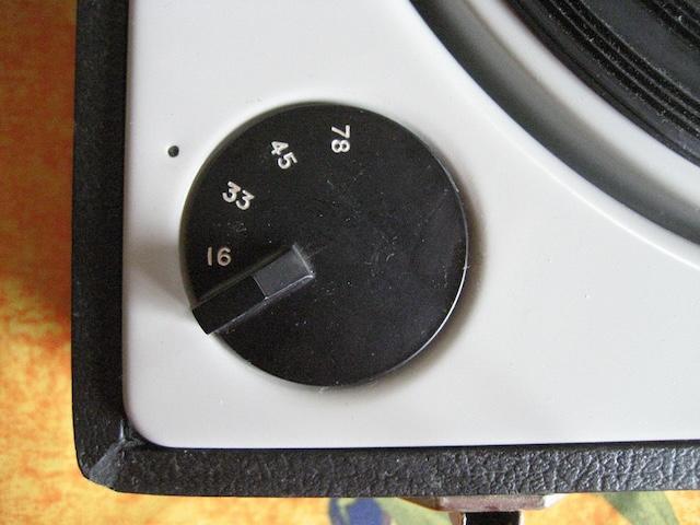 Close-up of a speed selector knob, vital for vinyl playback