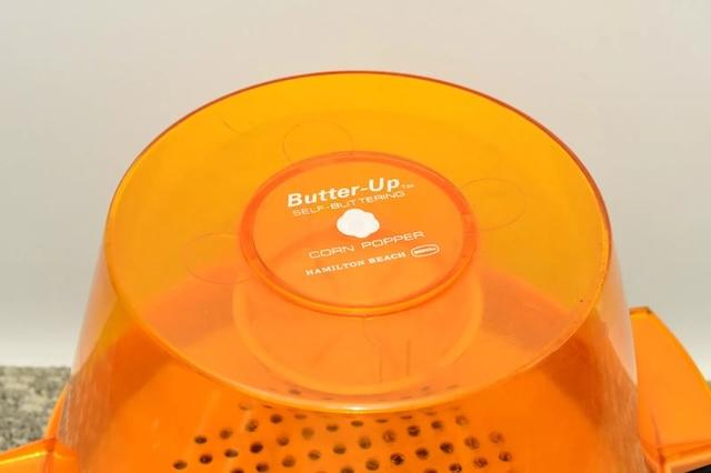 The "Butter-Up" logo reminds us of the innovation that allowed popcorn to be evenly buttered as it popped