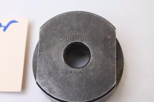 The marked imprint on the tool, clearly displaying "Suntour 888 Japan", a stamp of quality and precision for bicycle enthusiasts back in the day
