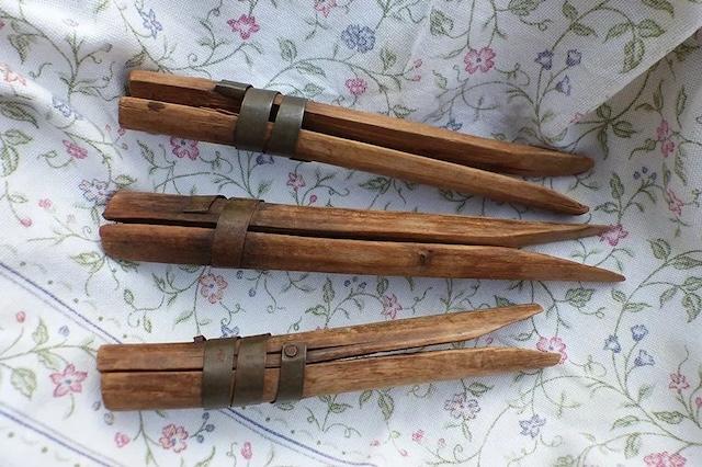 These pins, with their charmingly worn appearance, remind us of the handcrafted ingenuity of earlier times when household items were built to las