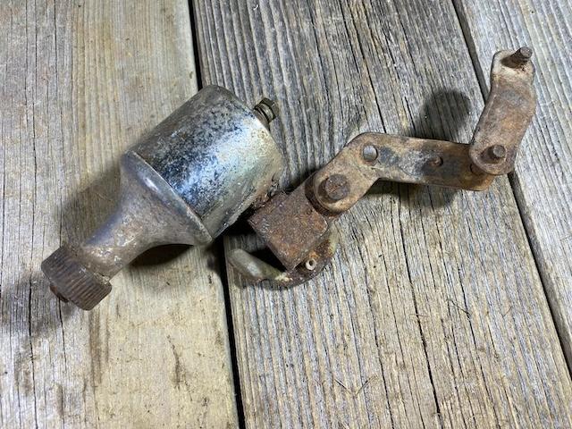 Another angle of the vintage bicycle light generator, emphasizing its durable materials that stood the test of time