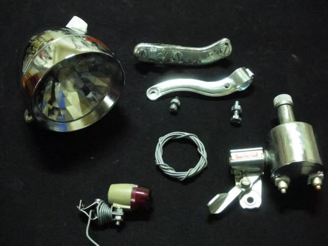 A closer look at the Ox-Head vintage bicycle light and generator set components, designed to light up the night through pedal power