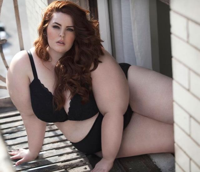 Tess Holliday exudes self-assurance in a striking black and orange dress, proving that beauty is all about self-expression