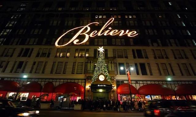 Macy's iconic holiday display with the "Believe" sign, ushering in the festive spirit with its dazzling Christmas tree