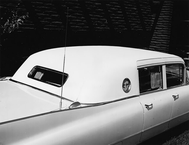 A close-up of the rear of Elvis’ 1960 Cadillac, showcasing the unique roof design and vintage detailing that made this car stand out.