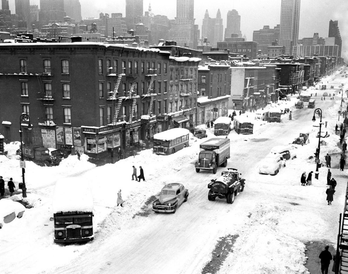 Second Avenue becomes an arctic battlefield as cars struggle—and fail—to push through the thick snow, 1947.