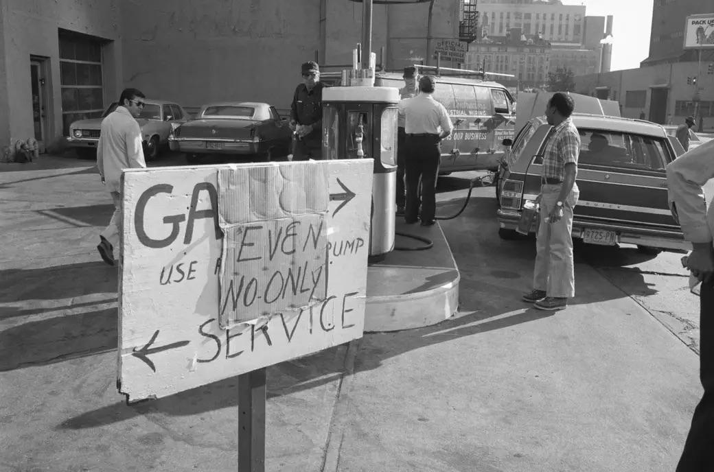 On June 20, 1979, despite a Mobil station's "even numbers only" sign at 33rd Street and First Avenue, a car with an odd-numbered plate defies the rule and fills up.