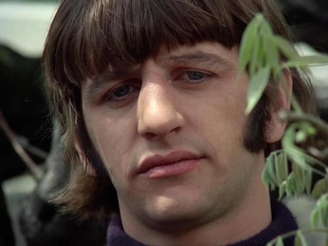 A close-up of Ringo Starr, highlighting the emotional depth in his eyes, a signature moment from The Beatles' later years