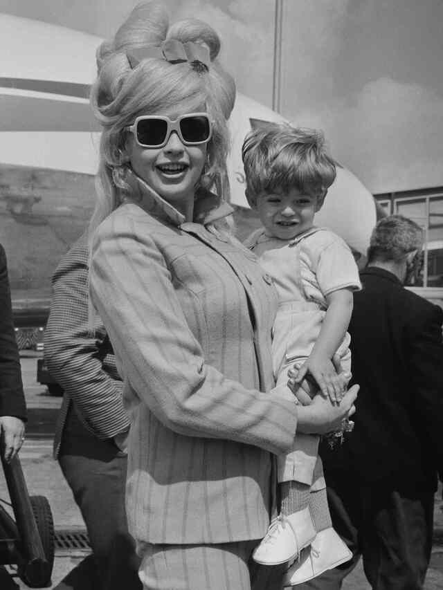 Jayne Mansfield and her son Antonio Raphael Ottaviano share a quiet moment together in 1967, encapsulating the love between mother and child. EVENING STANDARD/HULTON ARCHIVE/GETTY
