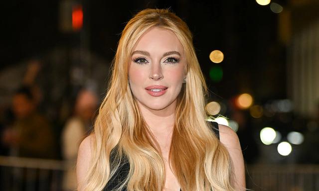 Lindsay Lohan lights up the red carpet with her effortlessly chic style and glowing beauty.