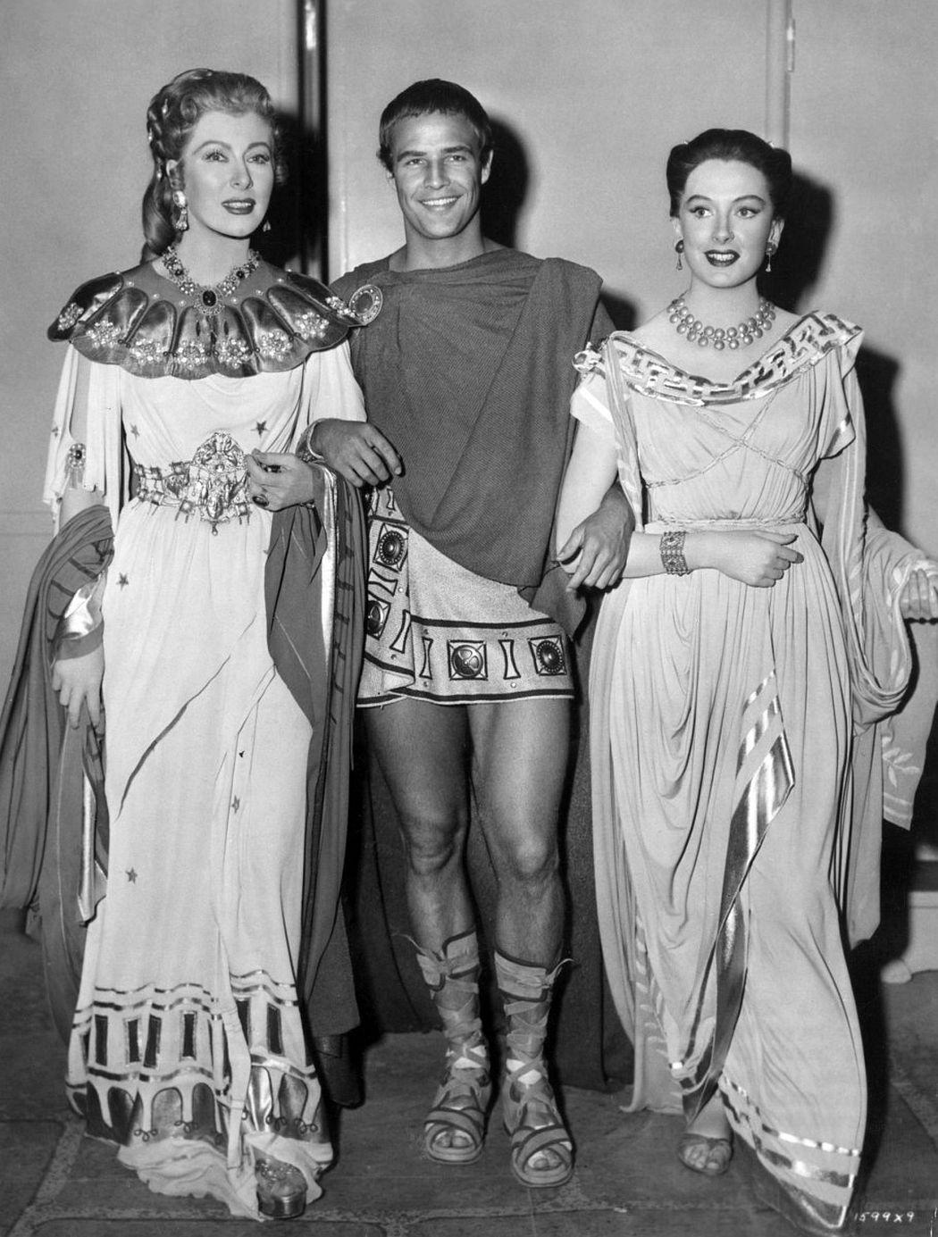 Marlon Brando alongside co-stars, posing at a promotional event for Julius Caesar (1953).