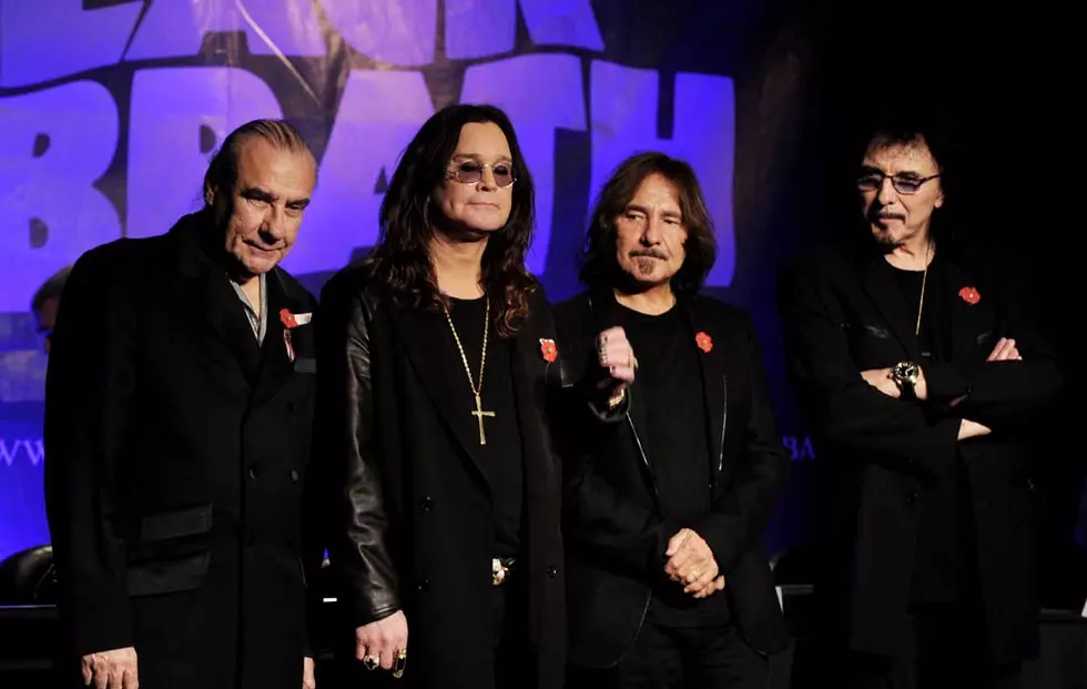 Ozzy Osbourne, Tony Iommi, Geezer Butler, and Bill Ward, 2011 – The original lineup reunites for a moment of pure rock greatness.