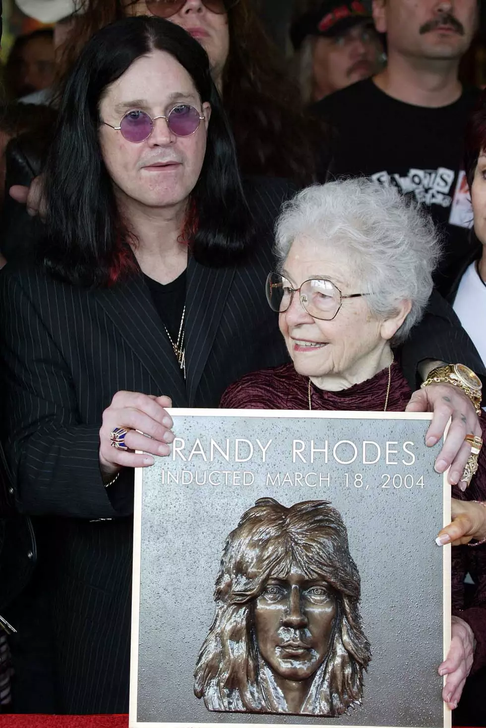 Ozzy Osbourne and Randy Rhoads’ mother, Dee, 2004 – A heartfelt tribute to the late guitar virtuoso.