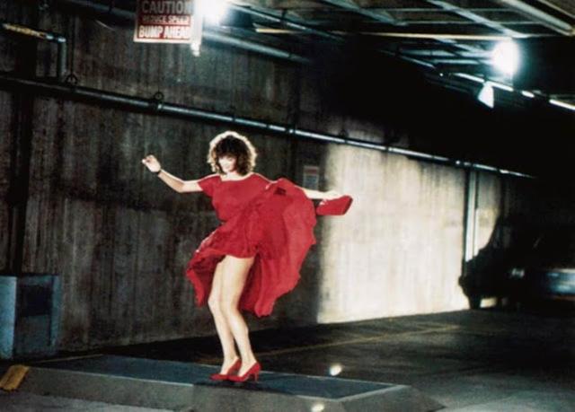 The red dress scene in The Woman in Red is, without a doubt, one of the most iconic moments in 1980s cinema