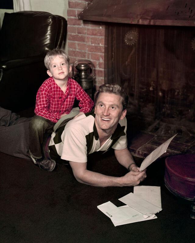 A charming moment between Kirk Douglas and his son Michael in 1950.