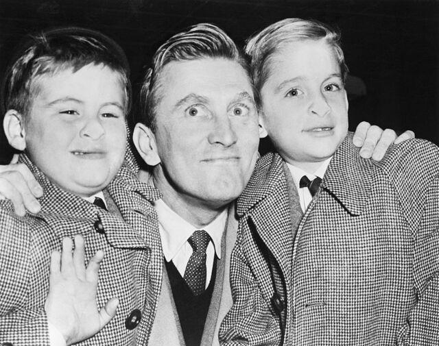 A heartwarming photo of Kirk with his sons, Joel (6) and Michael (9), taken in 1953.