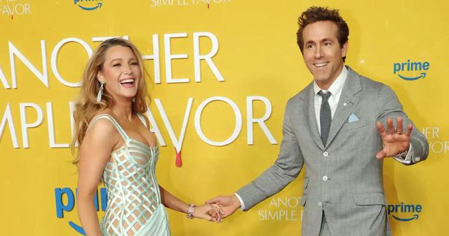 As the cameras flashed, Blake glided down the carpet, hand in hand with her husband, Ryan Reynolds