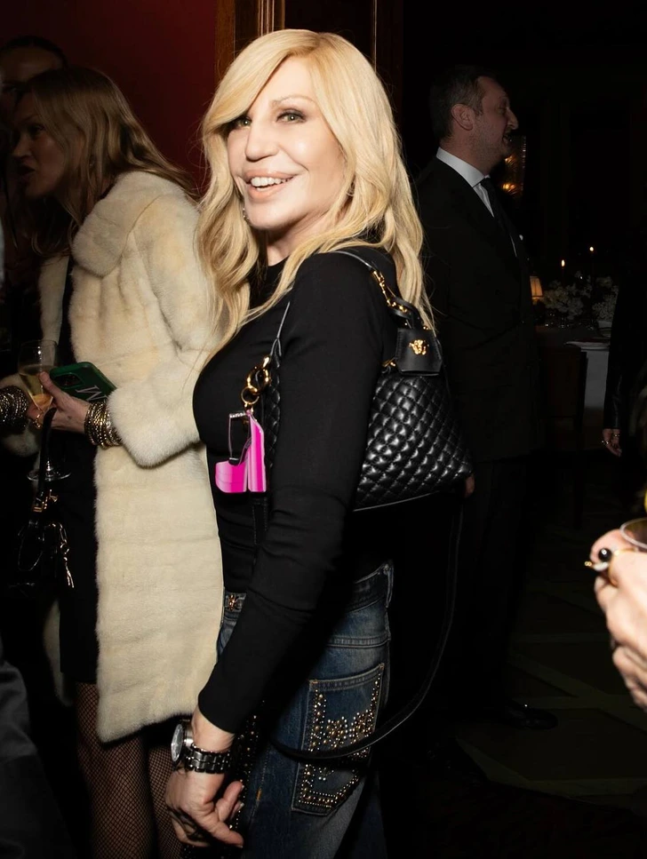 Donatella Versace looking effortlessly glamorous at an exclusive event.