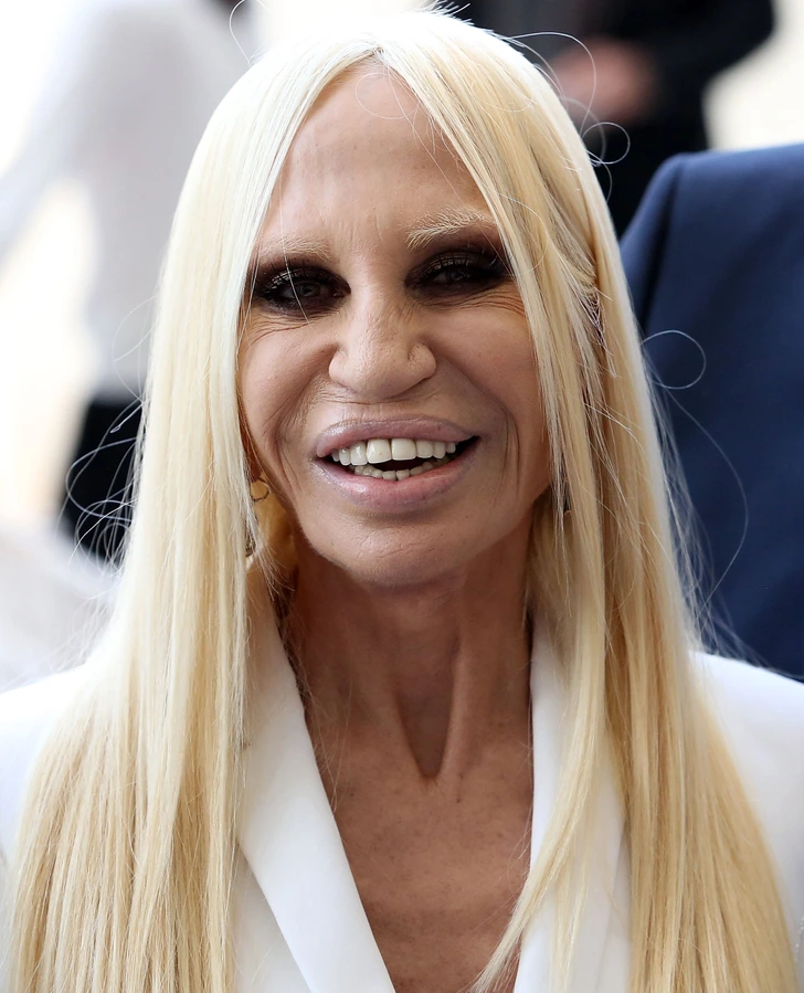 Donatella Versace's radiant smile, capturing the essence of her ageless beauty.