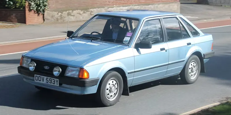 Ford Escort, 1982 – A reliable compact car that became a household name, favored for its practical features and everyday usability.