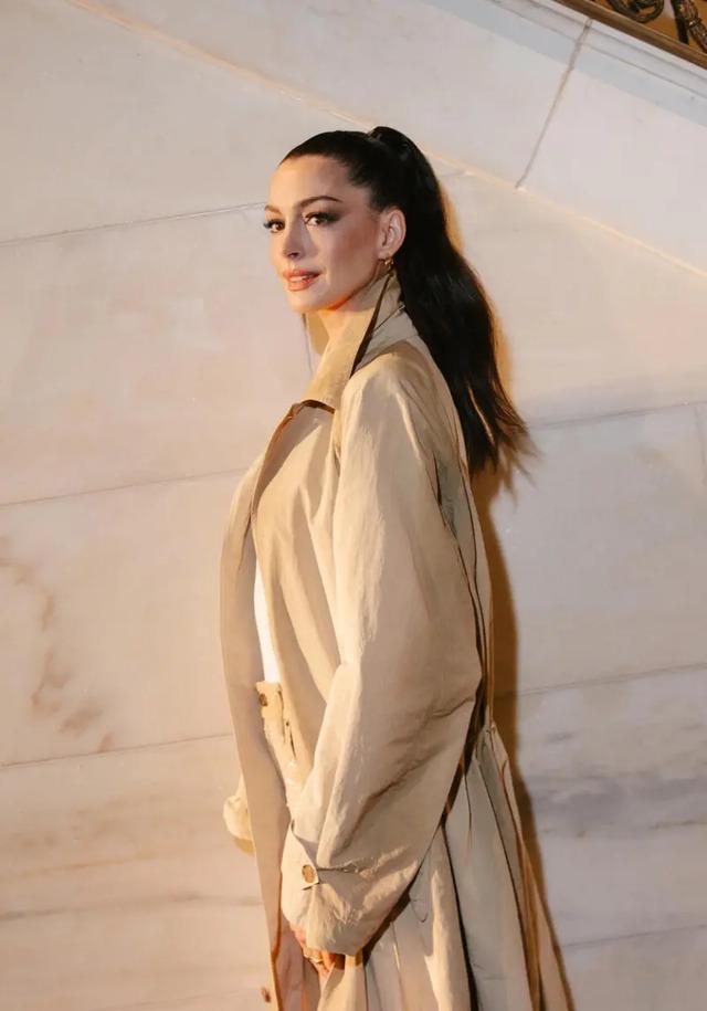 Hathaway’s slicked-back ponytail at the Ralph Lauren fashion show gave her face a taut effect, leading some to speculate it provided a subtle lift.