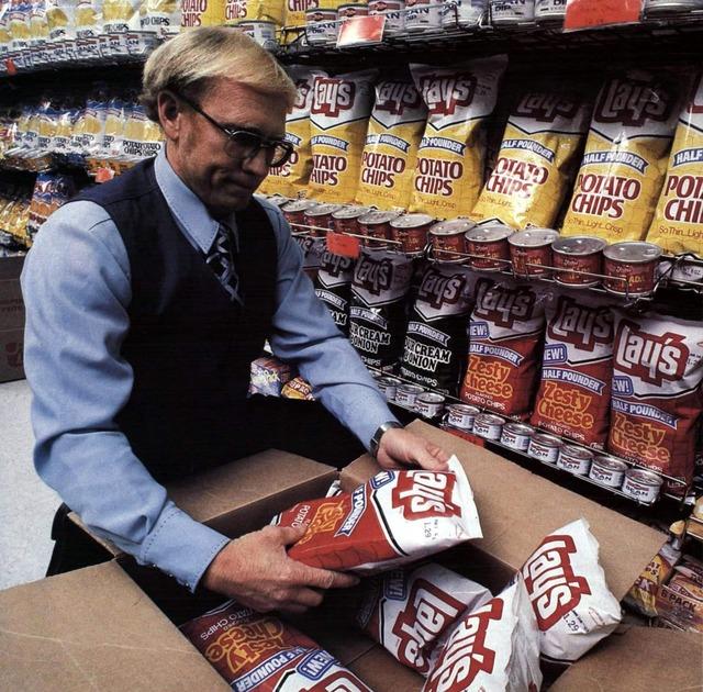 Lay’s potato chip bags on supermarket shelves (1981): The snack aisle staple.