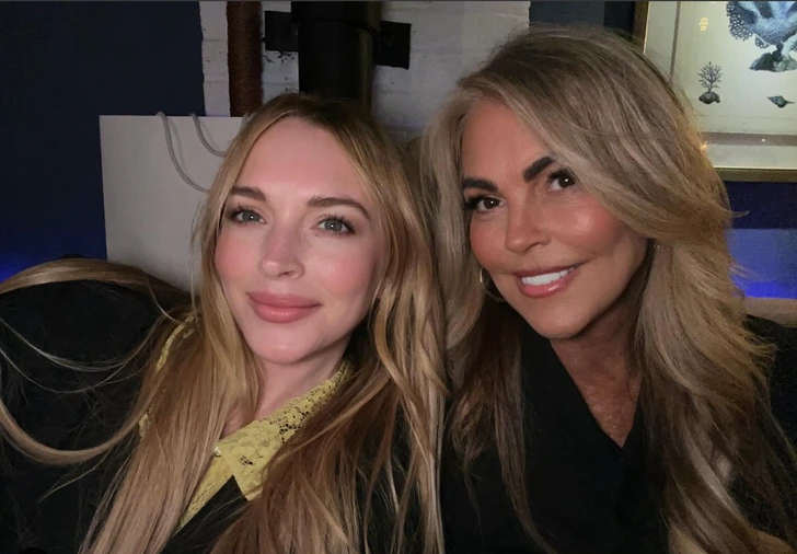 The picture showed Lindsay and Dina standing side by side, both glowing with joy