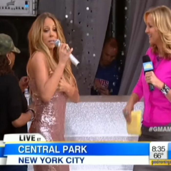 Mariah Carey’s Pink Dress Pops Open on Live TV