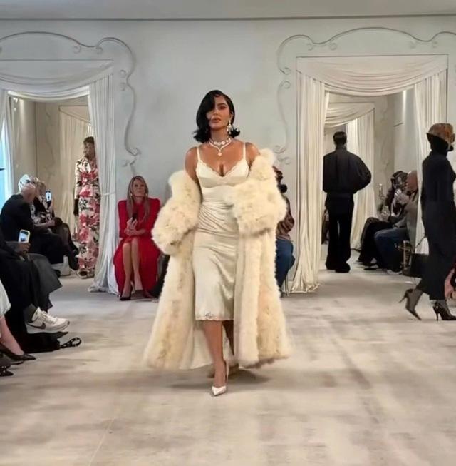 From every angle, Kim Kardashian captivates with her blend of classic sophistication and bold runway presence.