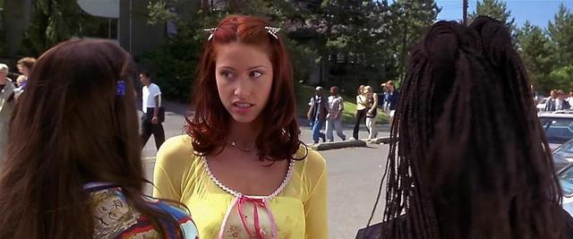 Shannon Elizabeth steals the spotlight with her unforgettable presence in Scary Movie, perfectly capturing the spirit of parody and satire.