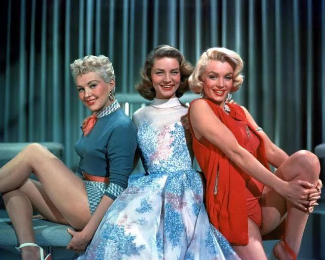 The dazzling trio of Betty Grable, Lauren Bacall, and Marilyn Monroe in How to Marry a Millionaire — a classic snapshot of Hollywood’s golden era.