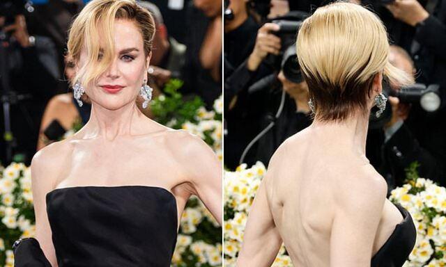 The sleek, side-swept waves framed her face perfectly, enhancing her timeless elegance.