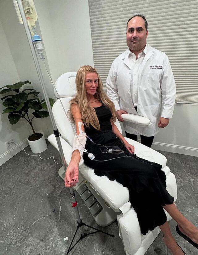 A turning point: Brandi receiving IV treatment under the care of Dr. Michael R. Scoma, an infectious disease specialist who offered new hope.