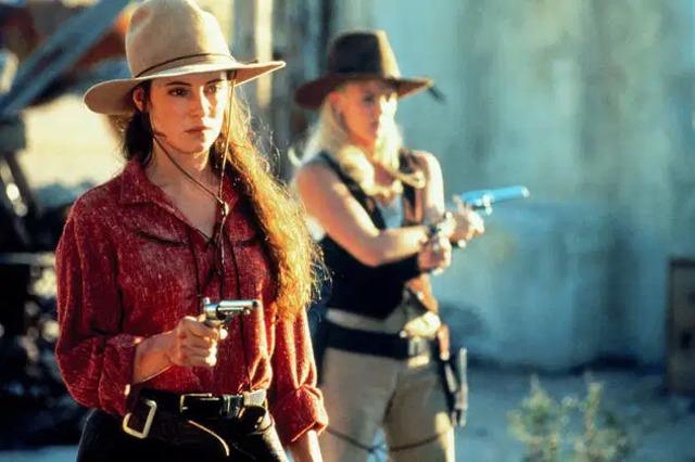 Cody Zamora and Lilly Laronette preparing for a standoff, side by side in the heat of battle.