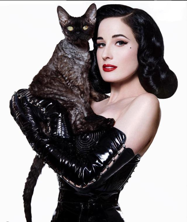 Dita embraces her feline side, exuding confidence in a striking latex outfit, proving she's as fierce as she is fabulous.