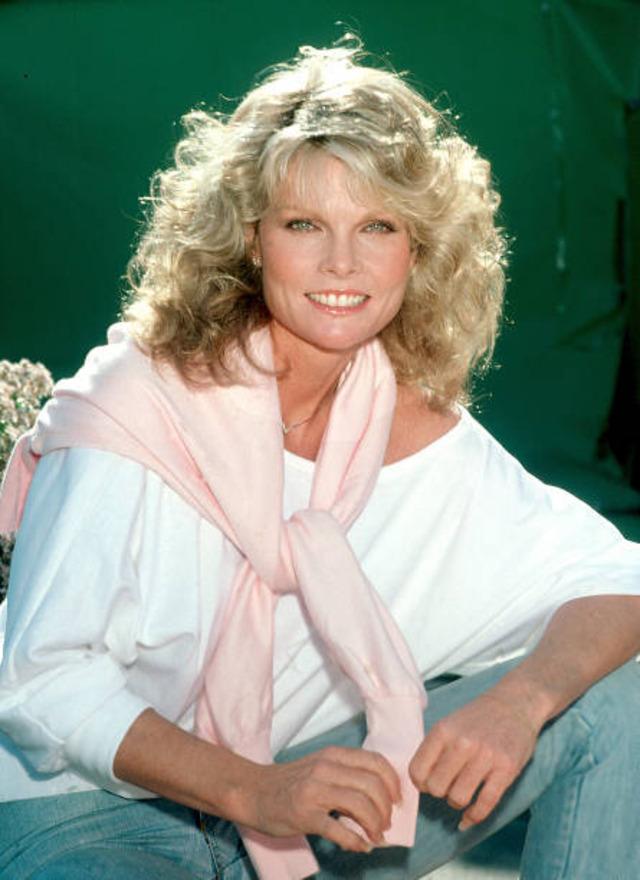 Effortlessly radiant — a candid Cathy Lee Crosby in casual pastels, her smile embodying the charm that won over a generation.