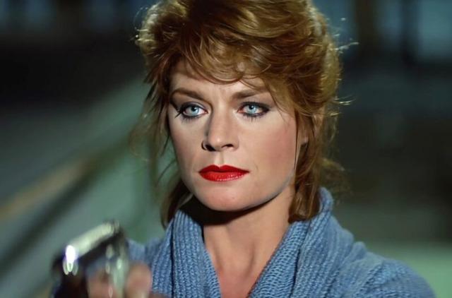 Iconic movie still of Meg Foster, where her icy blue eyes command the screen.