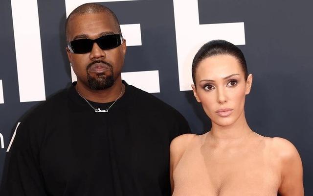 Kanye West and Bianca Censori step onto the red carpet in perfectly coordinated minimalist yet elegant looks.