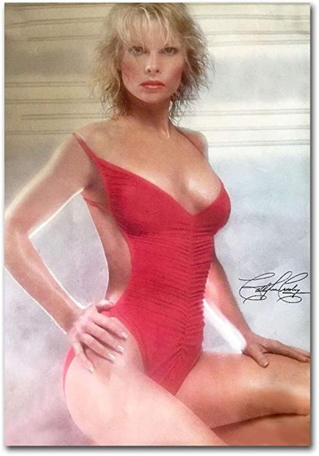 Radiating confidence, Cathy Lee Crosby stuns in a striking red swimsuit that became an iconic part of her glamour image.