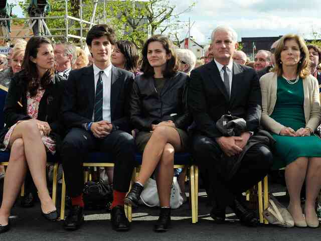 Rose Schlossberg sits alongside her family at a public event, channeling the Kennedy legacy.