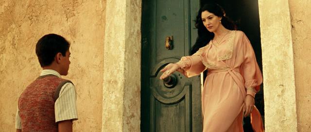 The story is told through the eyes of young Renato, a boy whose fascination with Malèna begins with adolescent curiosity