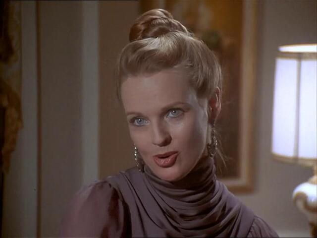 Classic Hollywood glamour—her piercing blue eyes and graceful poise made her unforgettable.