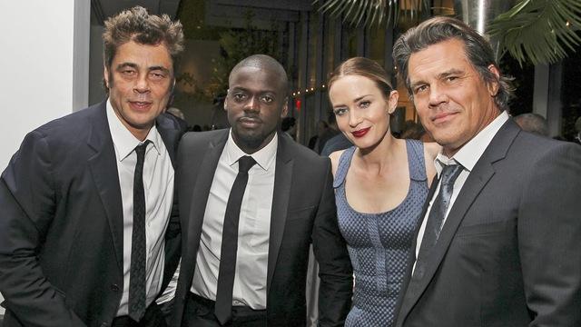 Emily Blunt with co-stars Benicio del Toro, Daniel Kaluuya, and Josh Brolin at a premiere event, sharing a lighthearted moment outside the intense world of Sicario (2015)