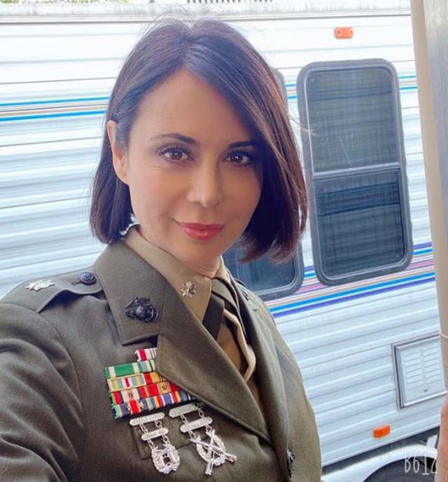 Returning to her iconic role, Bell proudly wears her decorated Marine Corps uniform, a powerful reminder of the groundbreaking character she brought to life.
