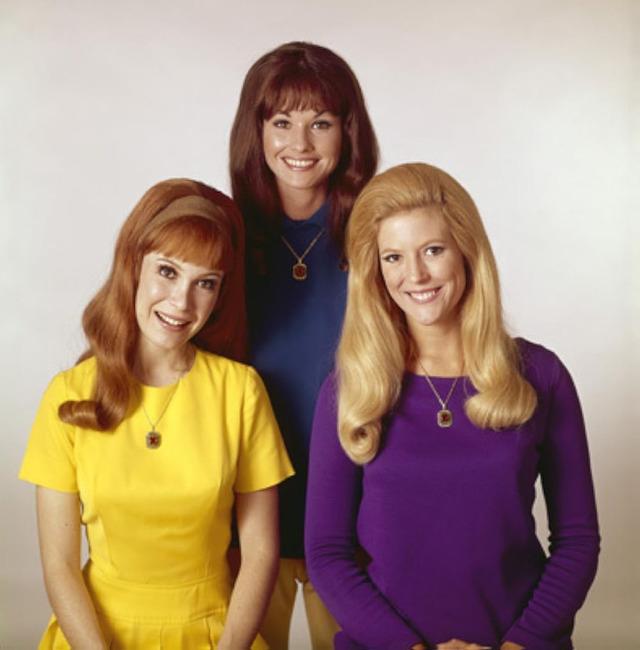 The iconic Bradley sisters in vivid color—Betty Jo, Bobbie Jo, and Billie Jo—each with her own personality.