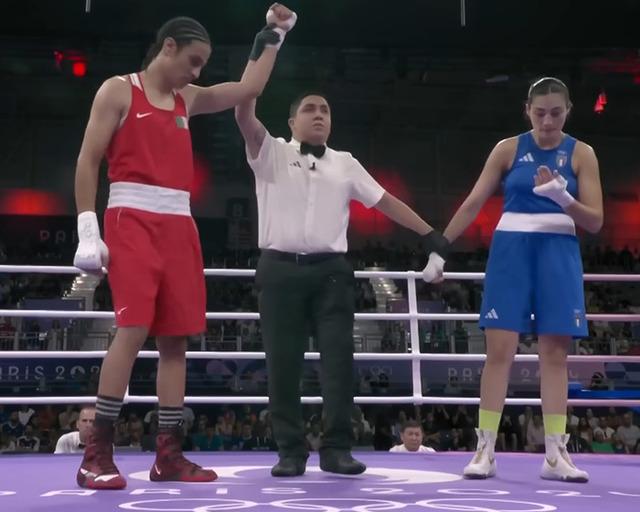Victory in Paris: the referee raises Khelif’s hand after a short but explosive Olympic bout.