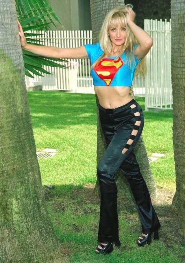 Elegance meets fun: Monique Noel embraces her role as a fashion and beauty icon in this chic pose.