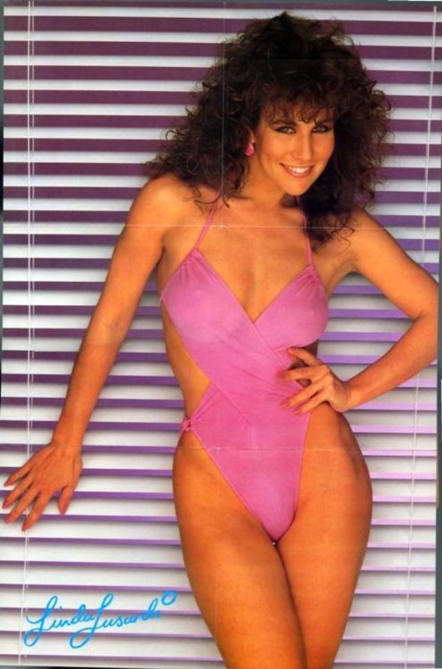 Iconic poster of Linda Lusardi in a pink bikini, during the peak of her modeling career.