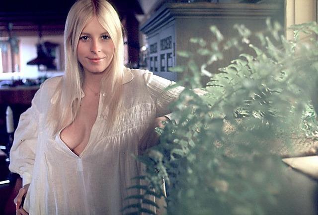 Liv Lindeland captured in a serene moment at home, showcasing her timeless charm and relaxed yet sophisticated style.